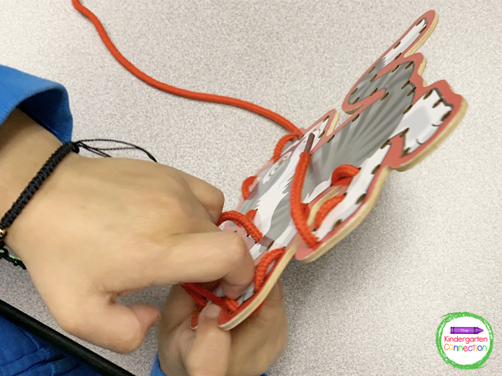 Having students use lacing cards works on hand-eye-coordination.